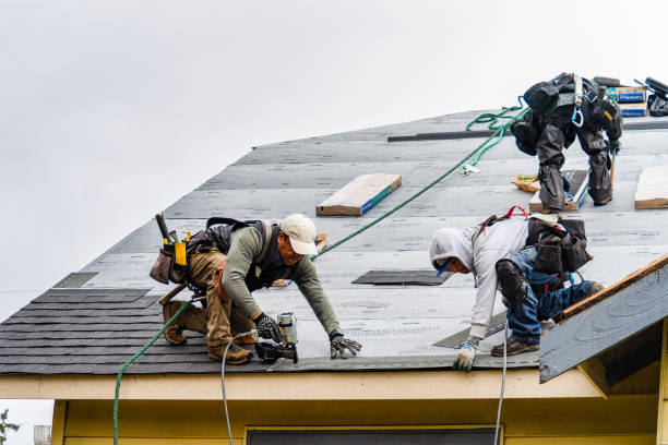 Professional Gutter Installation technician working in Sequim, WA